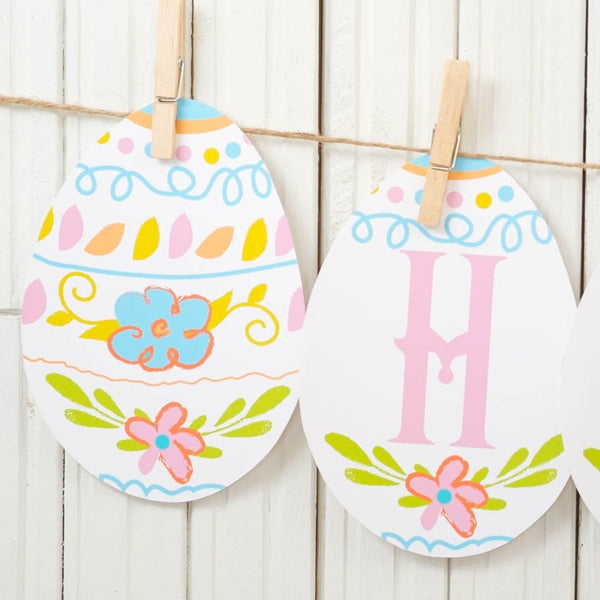 printable easter egg banner reads HAPPY EASTER cute colorful egg shaped bunting flag banner print at home for easter brunch party DIY